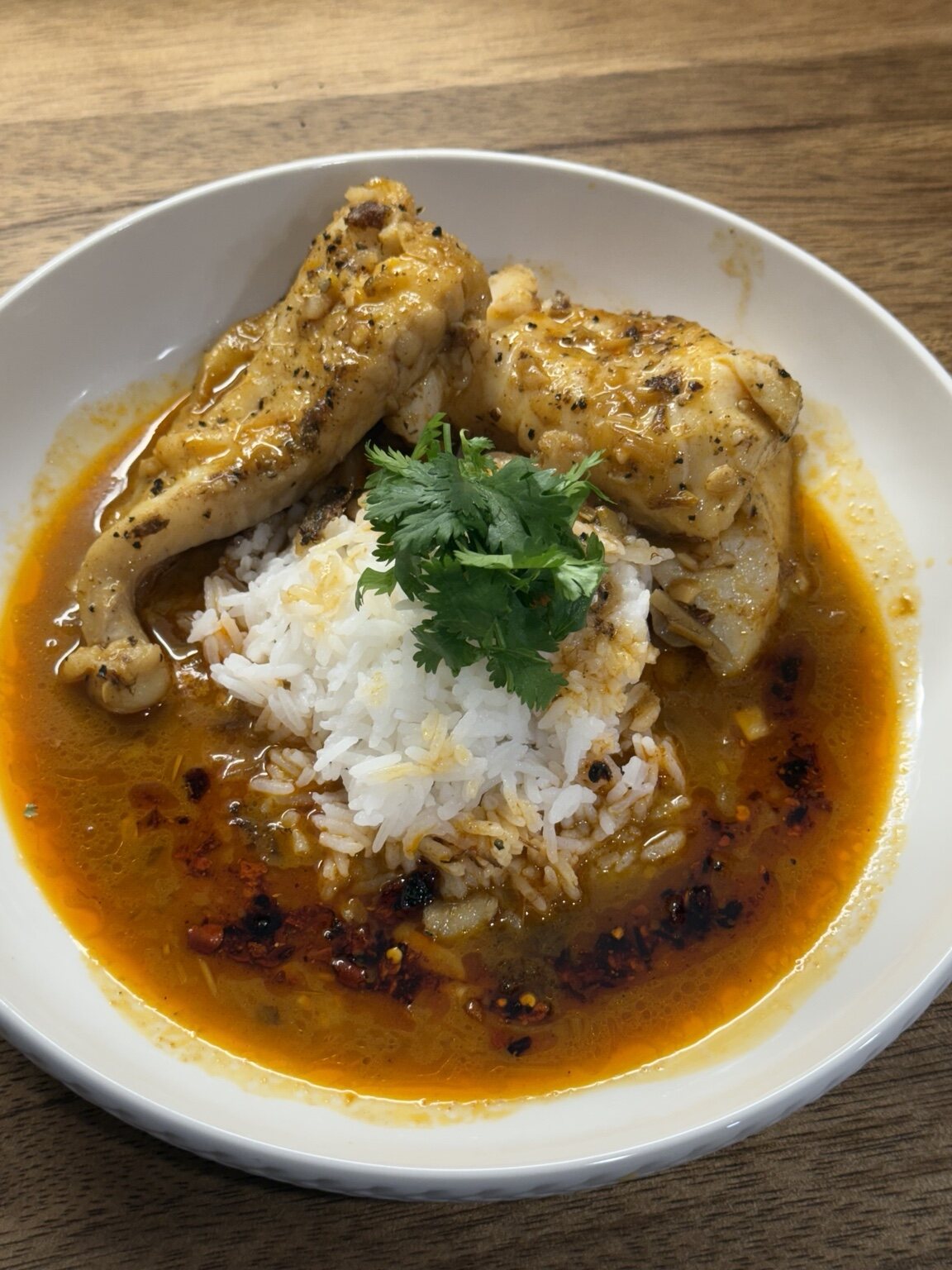 Sauced chicken served with rice
